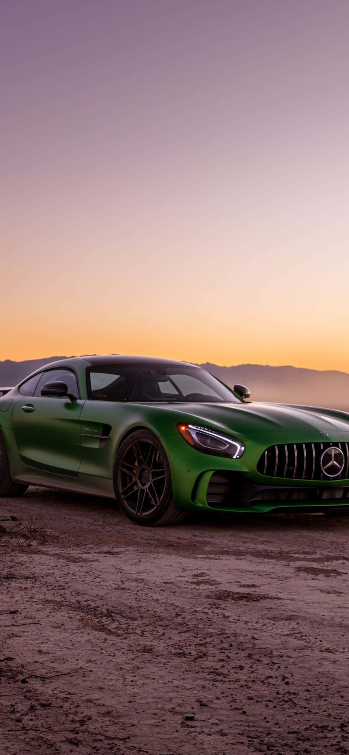 พื้นหลังสีเขียวสว่างของ iPhone Xs Mercedes Amg วอลเปเปอร์