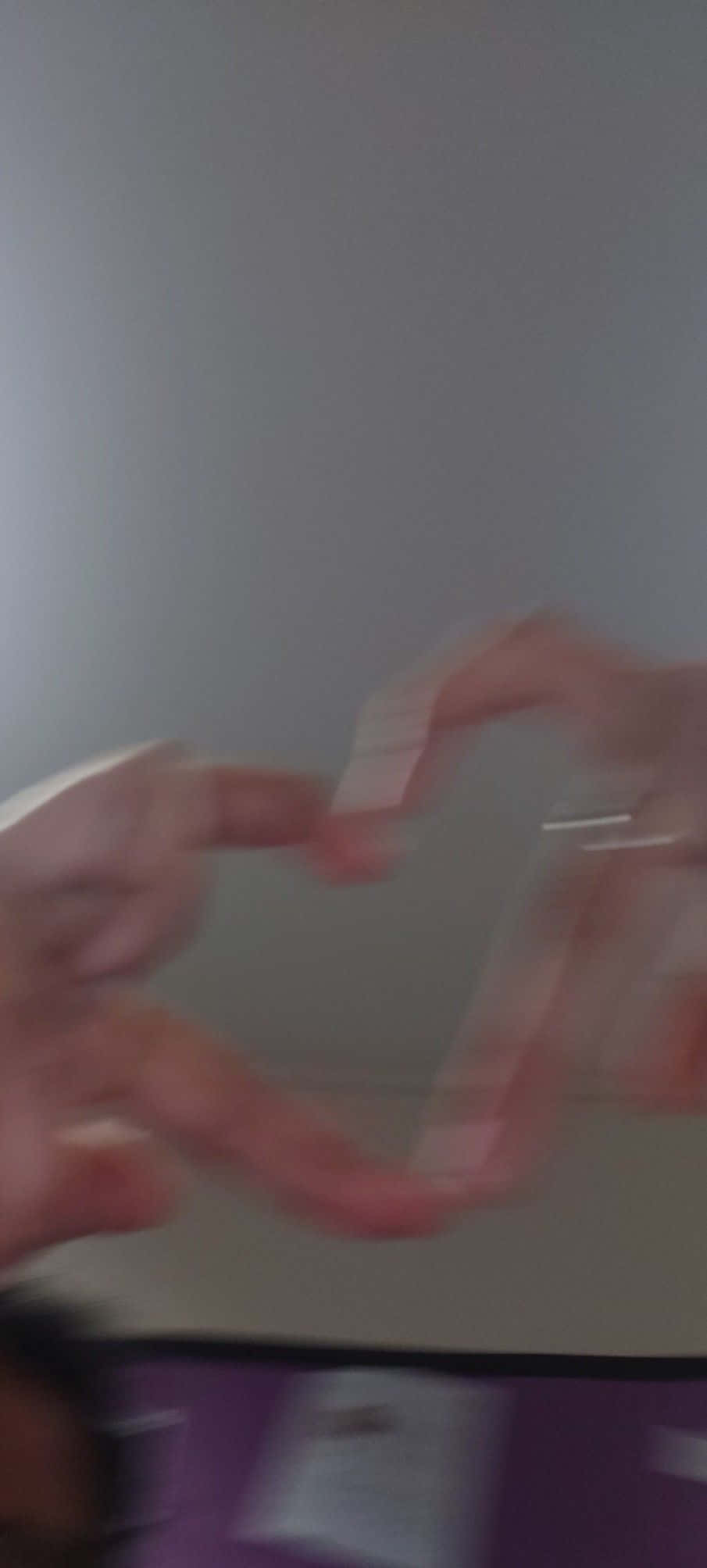 ภาพนิ้วมือเบลอเป็นรูปหัวใจ วอลเปเปอร์