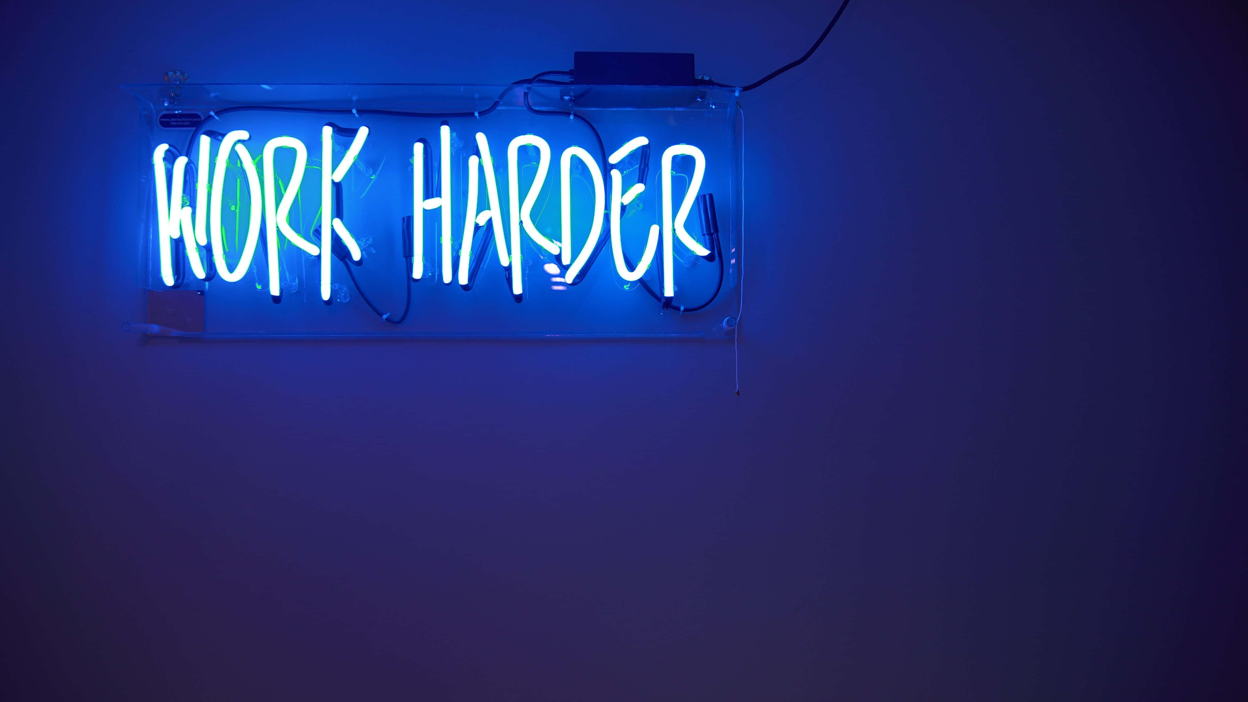 ภาพป้ายนีออนสีฟ้า Work Harder วอลเปเปอร์