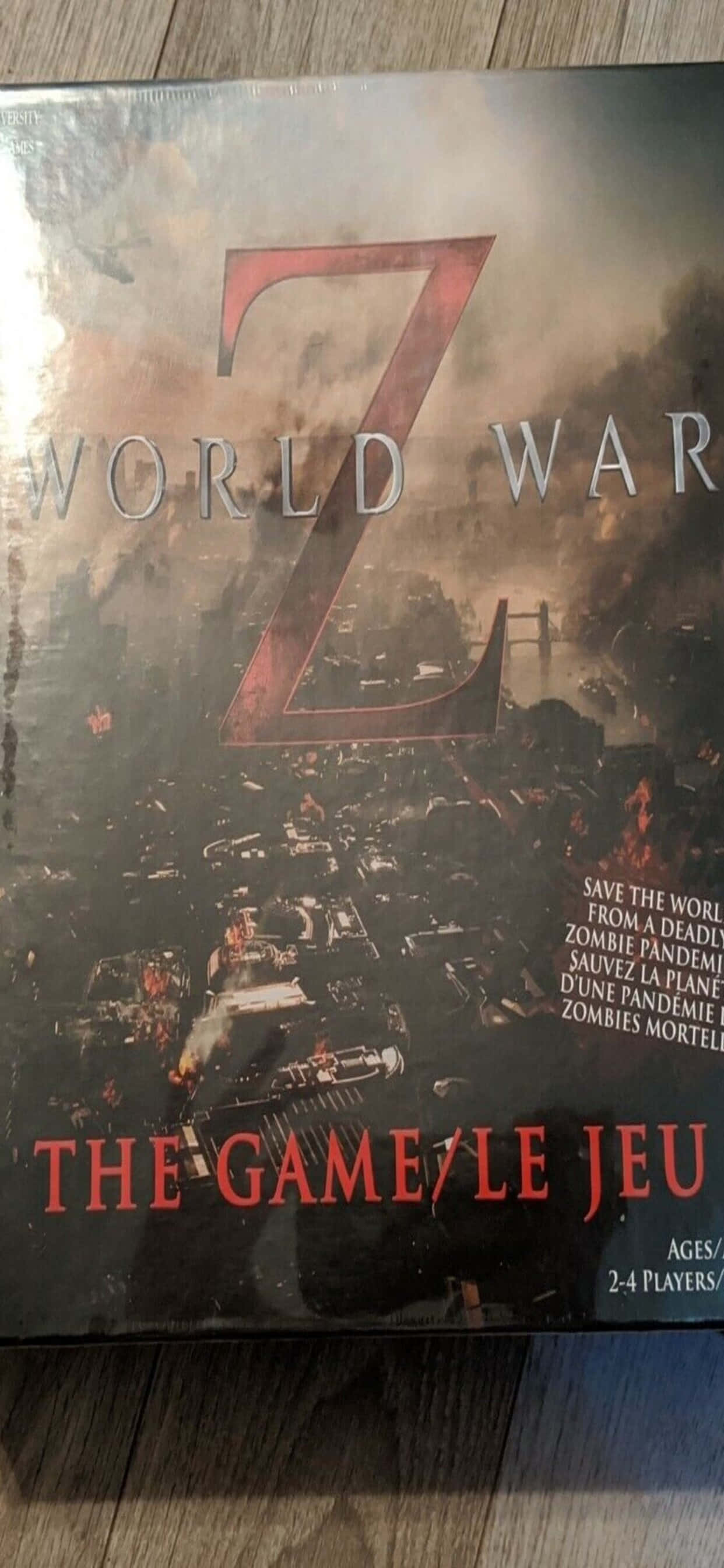 ภาพมืดหึมของฉาก World War Z บนหน้าจอ iPhone XS Max วอลเปเปอร์