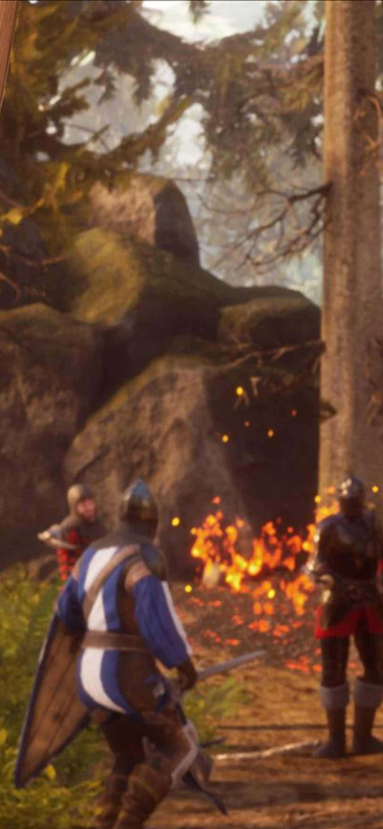ภาพหน้าจอของเกมที่มีคนสองคนในชุดเกราะ วอลเปเปอร์