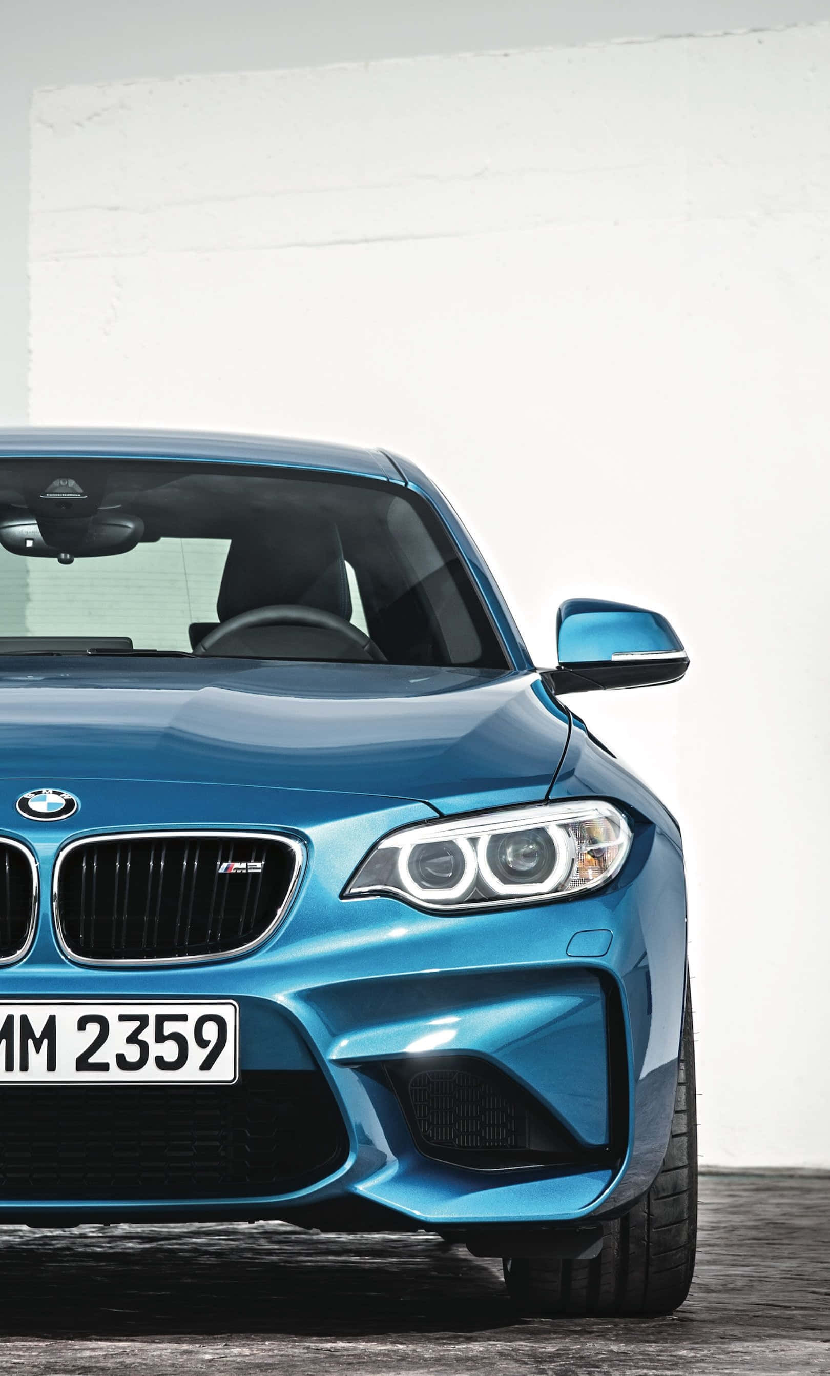 วอลเปเปอร์ BMW สุดหรูสำหรับ iPhone พร้อมรถสปอร์ตและโลโก้ วอลเปเปอร์