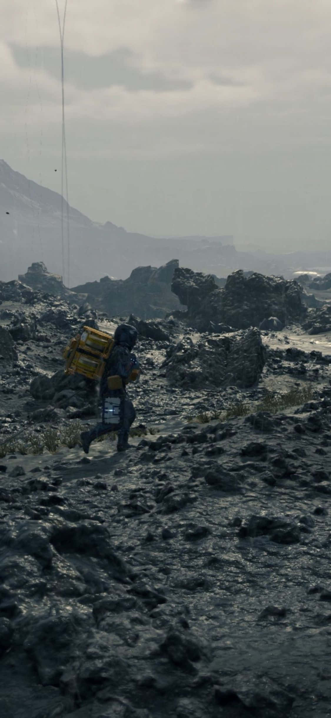 'สำรวจโลกหลังวันสิ้นโลกของ Death Stranding บน iPhone X ของคุณ!' วอลเปเปอร์
