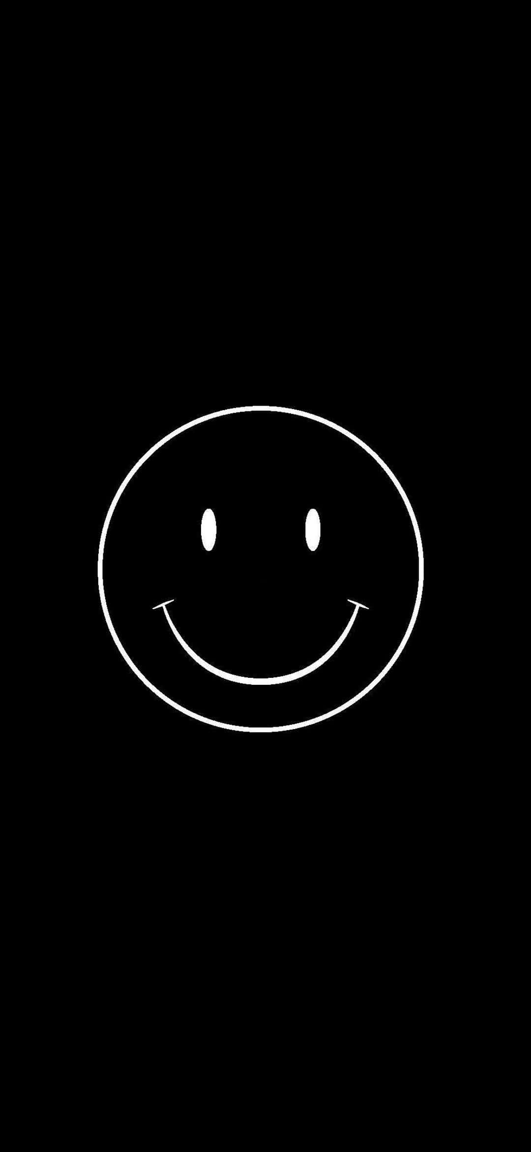 หน้ายิ้มสีขาวบนพื้นหลังสีดำ วอลเปเปอร์