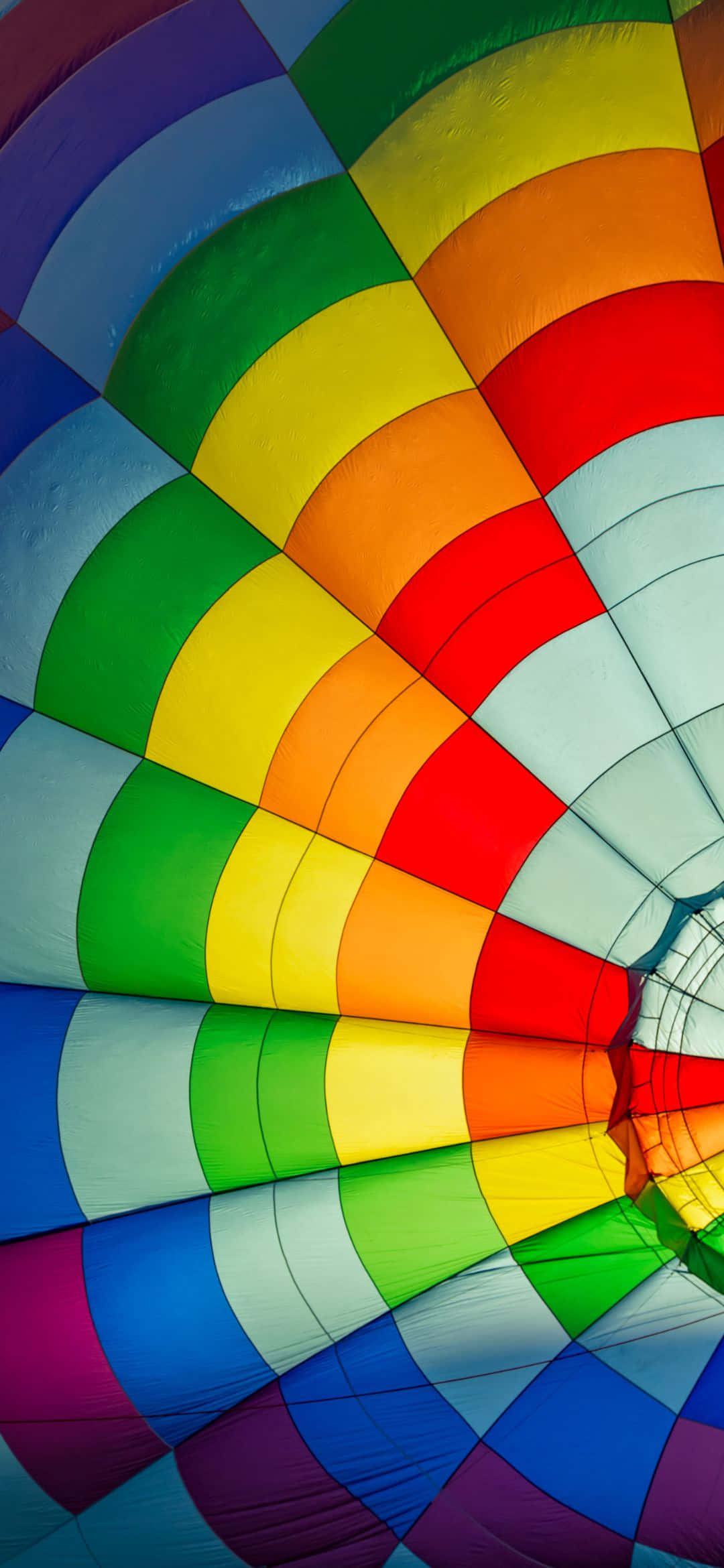 เกลียวแสงและสีสันหลอกหลอนท้องฟ้ายามค่ำคืน วอลเปเปอร์