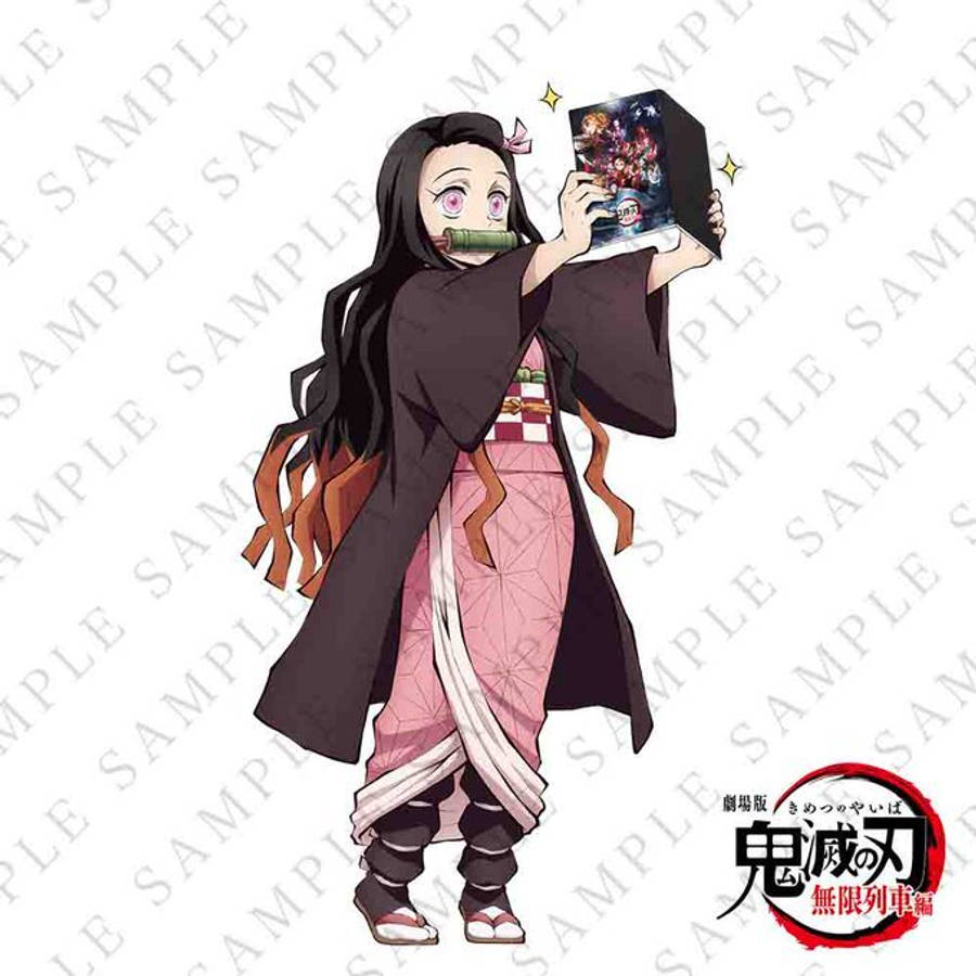 เนซูโกะกับหนังสือ Demon Slayer วอลเปเปอร์