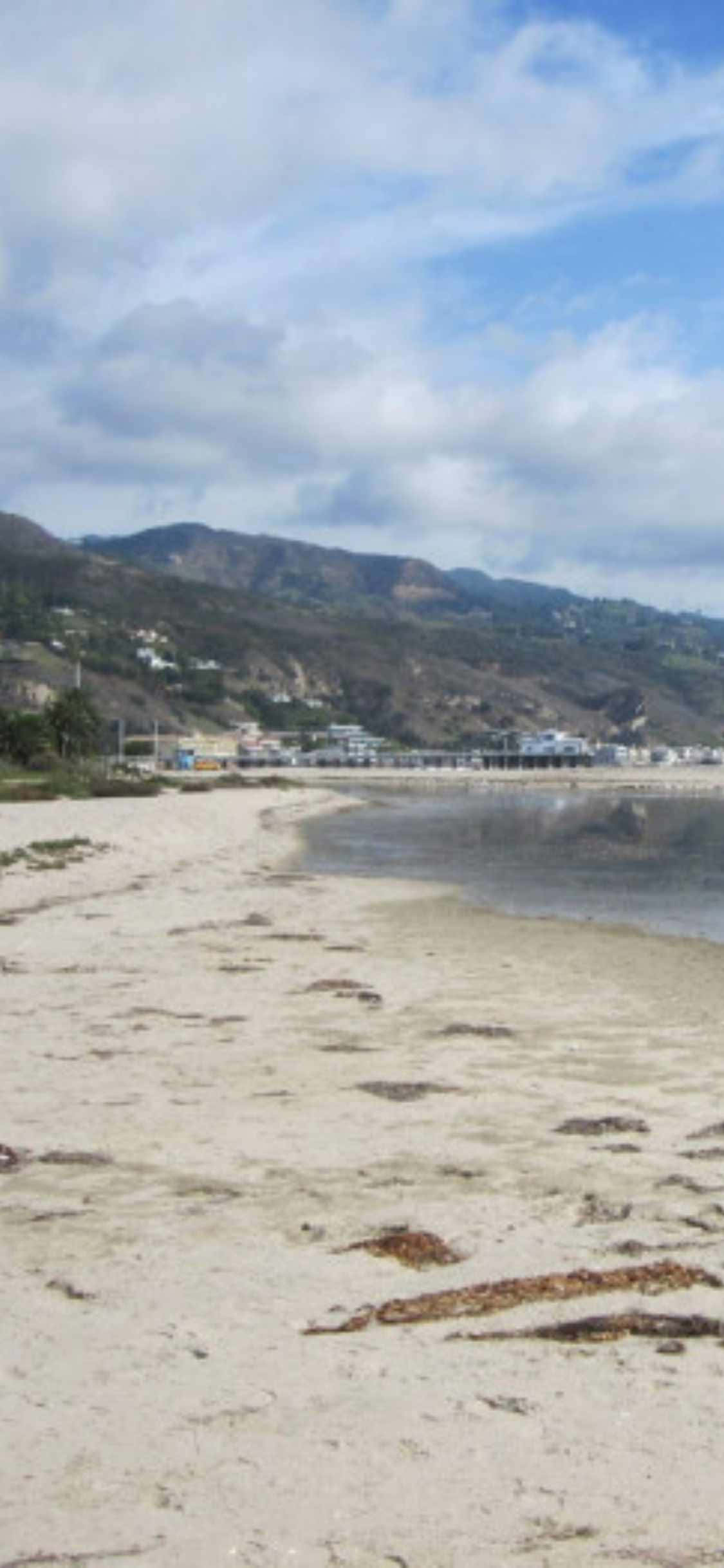 เพลิดเพลินกับวิวสวยของ Malibu จาก iPhone XS ของคุณ วอลเปเปอร์
