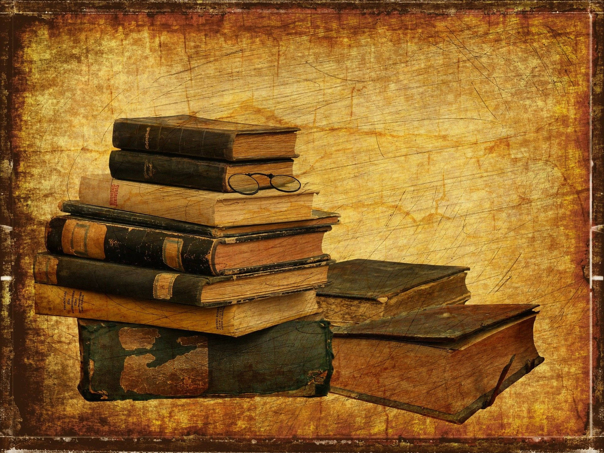 แคปชั่น: กองหนังสือเก่าที่สวยงามน่ามอง วอลเปเปอร์