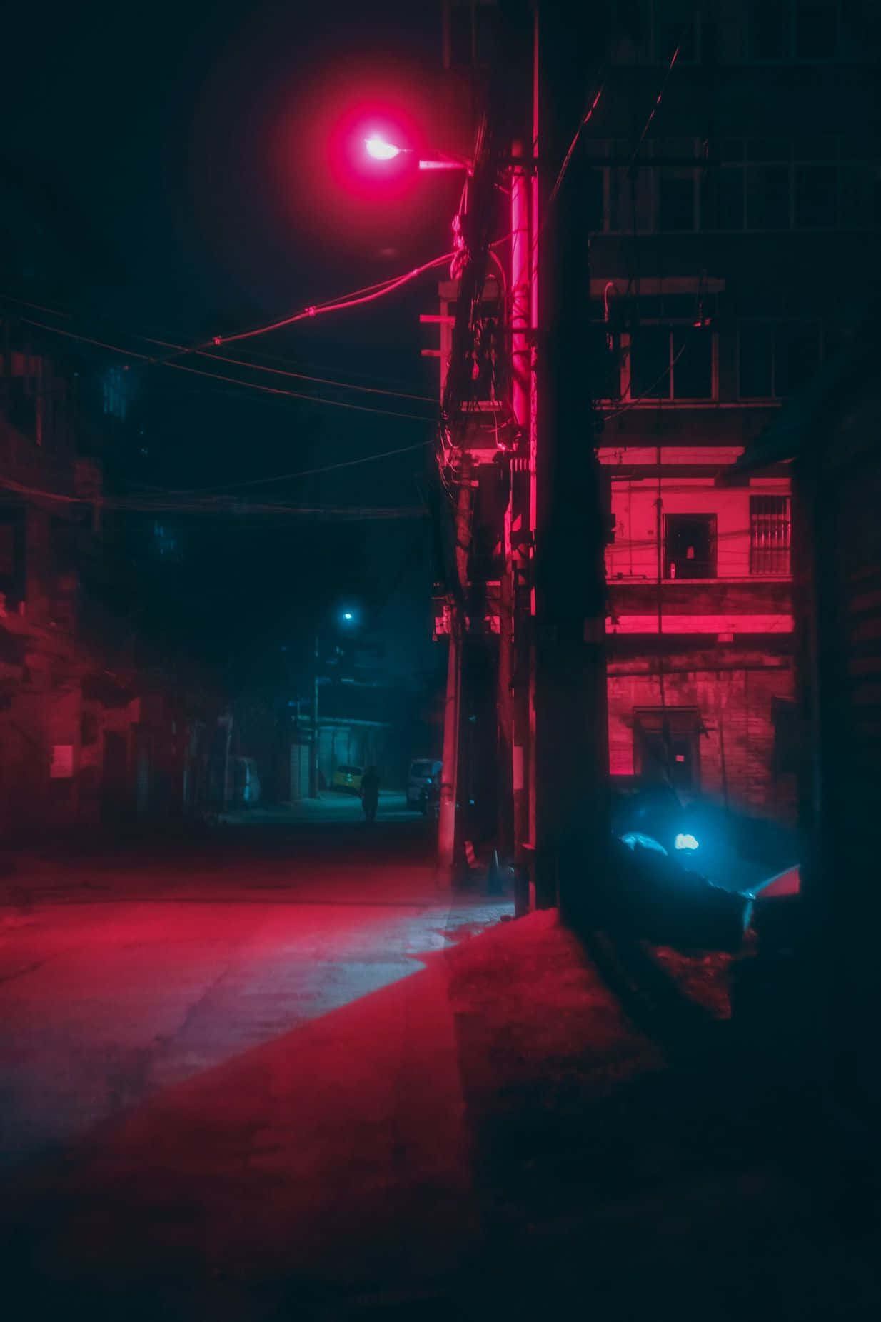 แสงนีออนสีแดงสวยงามส่องสว่างถนน วอลเปเปอร์