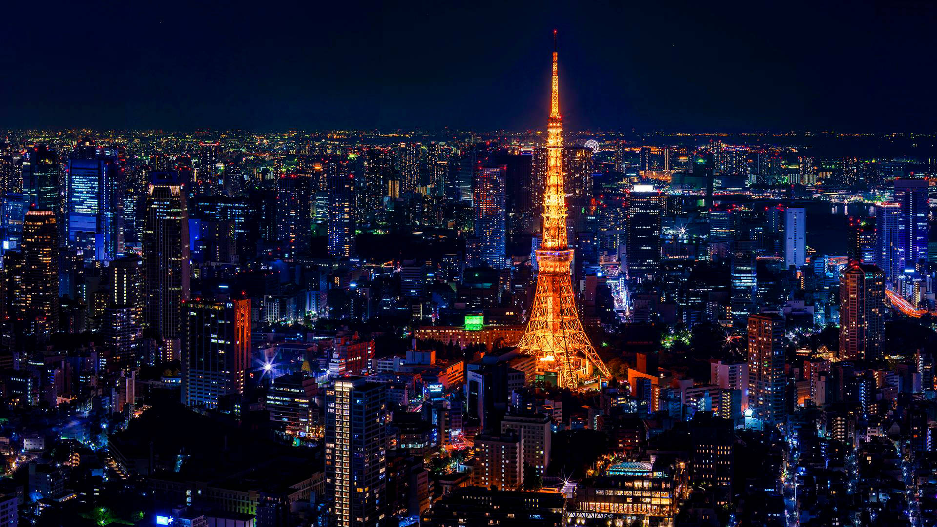 โตเกียวทาวเวอร์สีทองและแสงไฟเมืองหลากสี วอลเปเปอร์