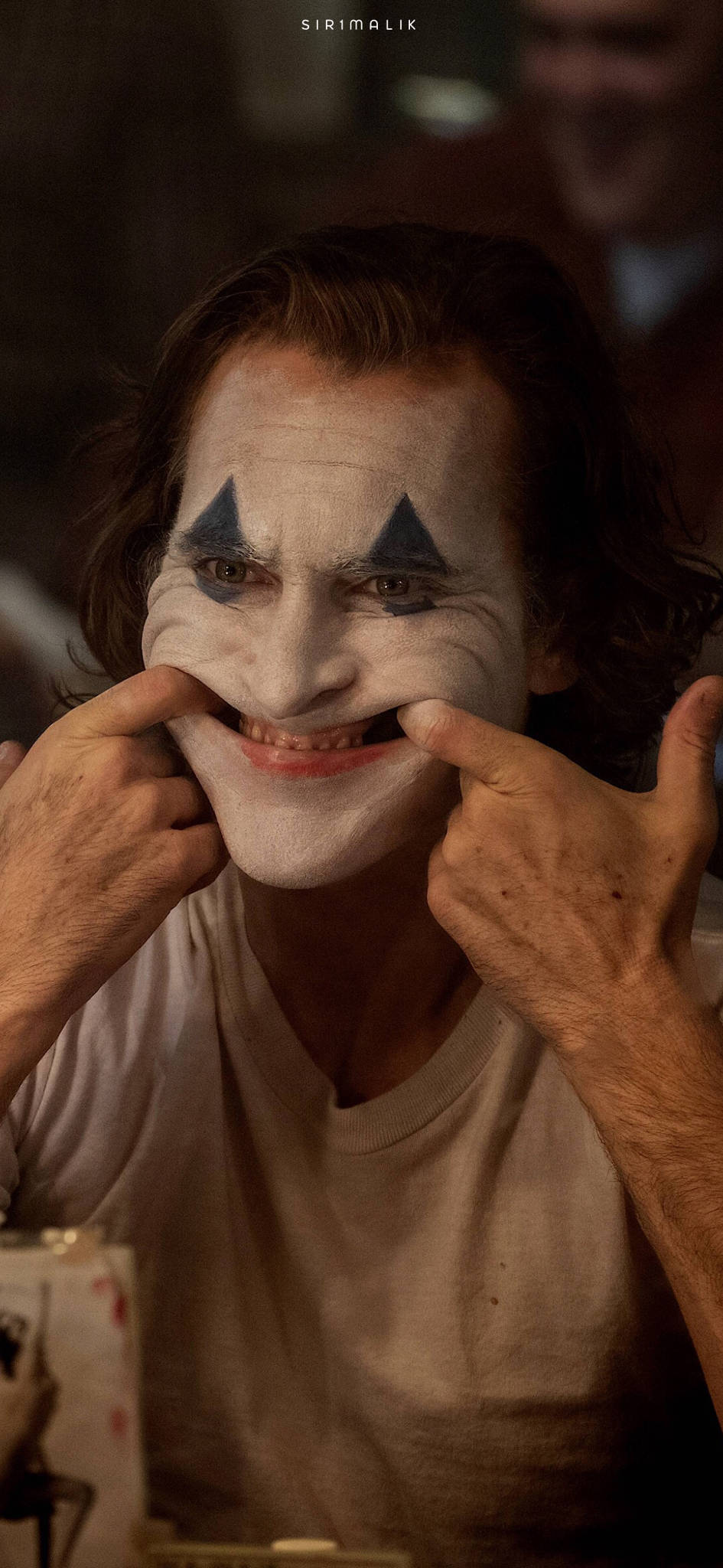 ใบหน้าหำหำ Joker ภาพยนตร์ปี 2019 วอลเปเปอร์