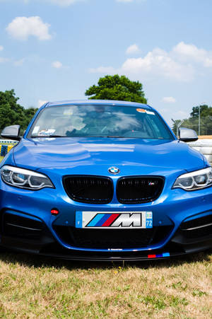 BMW สีน้ำเงินสวยบนสนามแข่ง — เสี่ยวหมี่ แท็บเล็ต วอลเปเปอร์