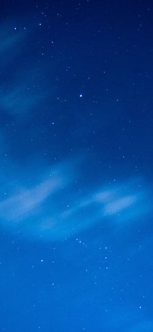 iPhone ท้องฟ้ายามค่ำคืนสีน้ำเงิน — Galaxy S24 วอลเปเปอร์