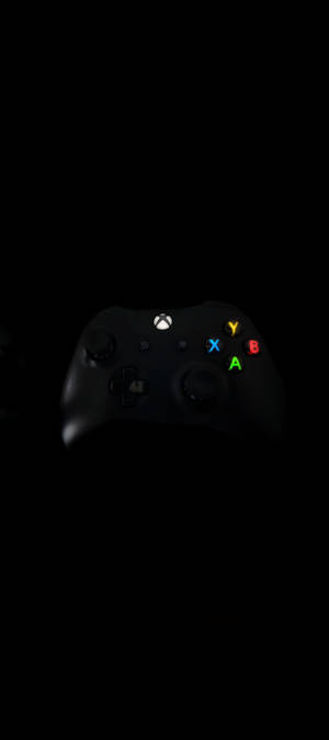 คอนโทรลเลอร์ Xbox สีดำ 8K สำหรับมือถือ — พิกเซล 10 วอลเปเปอร์