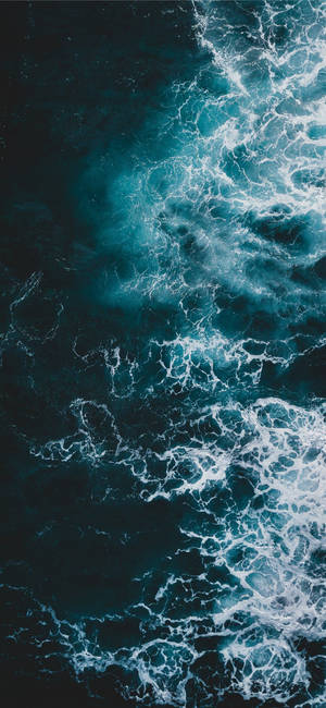 วอลเปเปอร์คลื่นยอดขาวมหาสมุทรลึก iPhone 11
