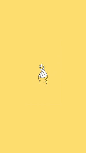 นิ้วหัวแม่มือรูปหัวใจ พาสเทลเหลือง aesthetic — พาสเทลเยลโลว์ วอลเปเปอร์
