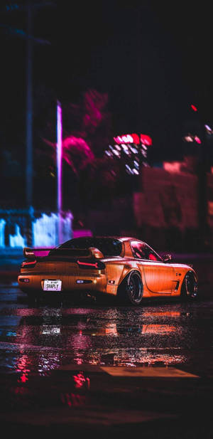 รถสไตล์ JDM สีส้มยามค่ำคืน