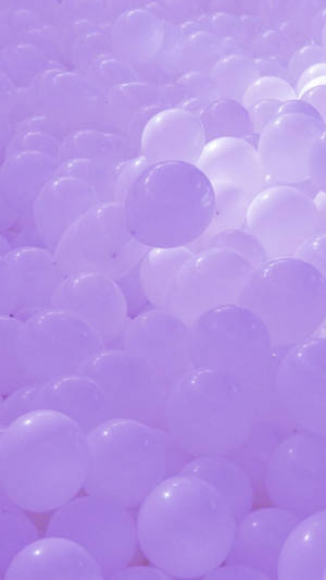 ลูกโป่ง iPhone สีม่วงอ่อน — iPhone สีชมพูสวยงาม วอลเปเปอร์