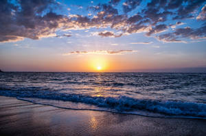 ภาพถ่ายสต็อกชายหาดยามพระอาทิตย์ตกดินฟรี
