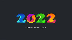วอลเปเปอร์ศิลปะนีออนสีสันสดใสสวัสดีปีใหม่ 2022 — Studio Display วอลเปเปอร์