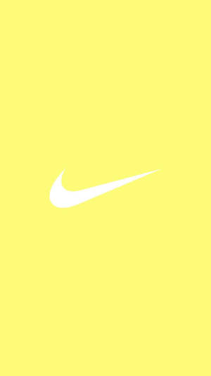 สีพาสเทลเหลืองน่ารักพร้อมโลโก้ Nike อันเป็นเอกลักษณ์ — พาสเทลเยลโลว์ วอลเปเปอร์