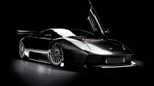 วอลเปเปอร์รถสุดเจ๋งของ Lamborghini สีดำพร้อมประตูปีกนก