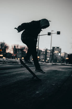 วอลเปเปอร์เด็กสเก็ตทำท่า Heelflip — ทไวไลท์ วอลเปเปอร์