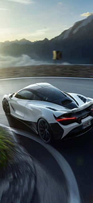 พื้นหลัง iPhone Xs McLaren 720s — พระอาทิตย์ขึ้น วอลเปเปอร์
