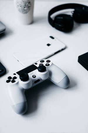 โต๊ะ iPhone พร้อมจอย PlayStation — เสี่ยวหมี่ แท็บเล็ต วอลเปเปอร์