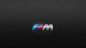 โลโก้ BMW M พื้นผิวไม้สีดำ — BMW วอลเปเปอร์
